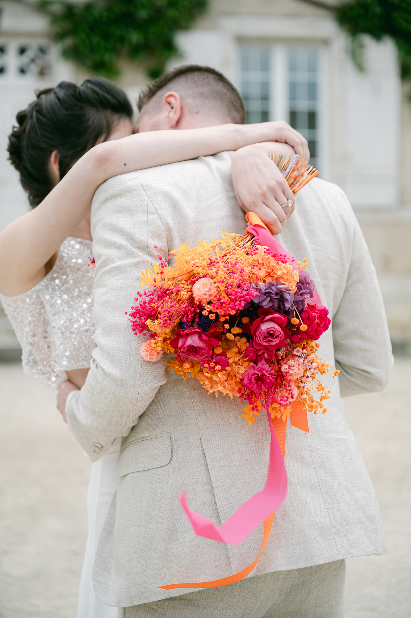 Bouquet de mariée orange, rose et violet